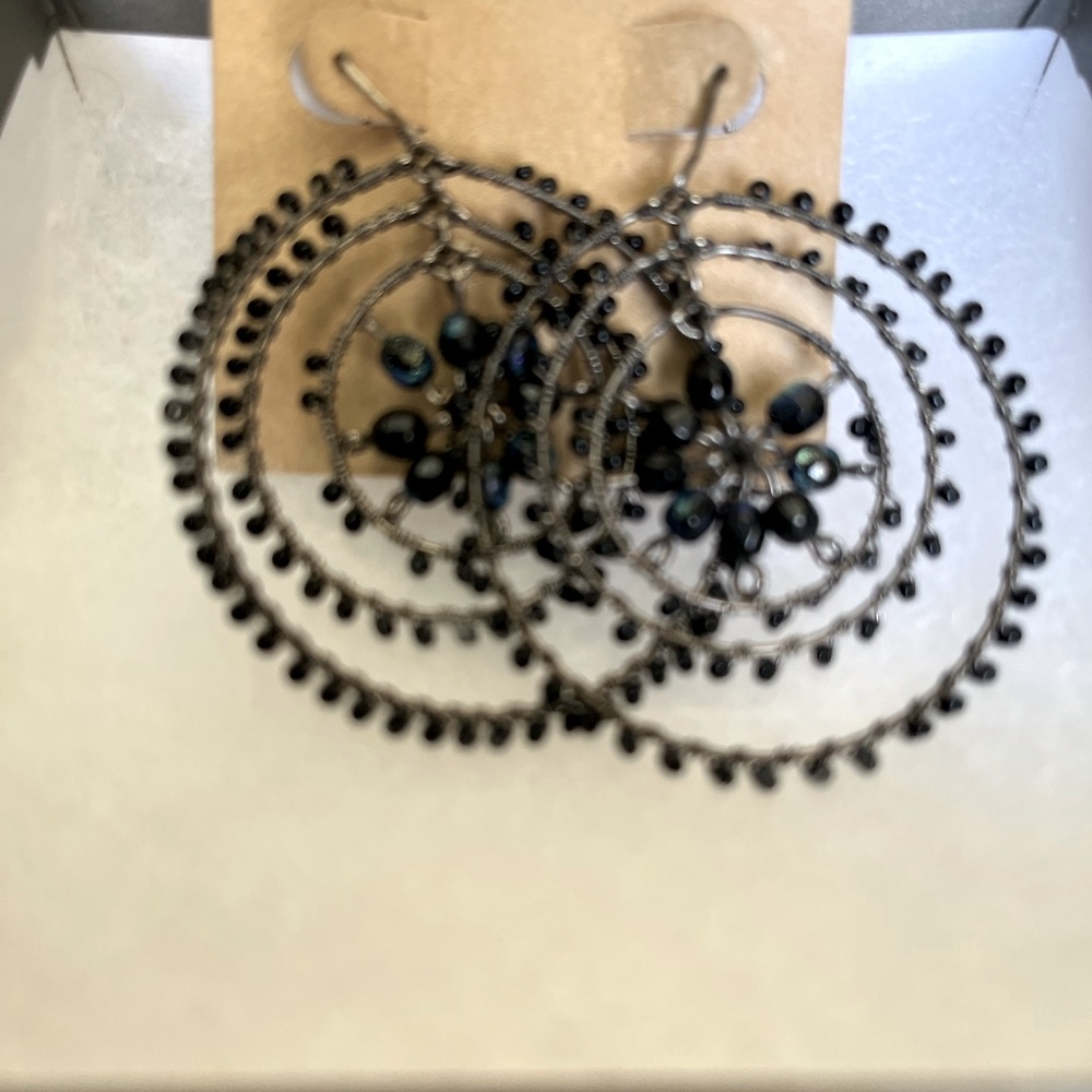 TALBOTS JEWELRY These whimsy earrings have a circular style. Dance all night!!